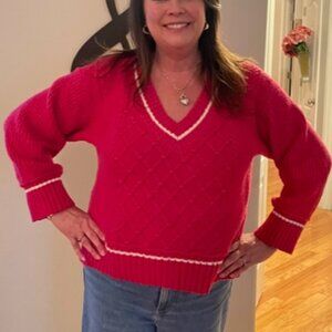 Ready for Valentines with this collegiate pink sweater from Anthropologie.